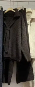 Acrylic knit sweater suit two-piece set showing top and trousers in beige colour