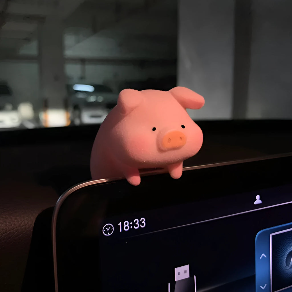 Cartoon pig resin car decoration accessory on vehicle dashboard