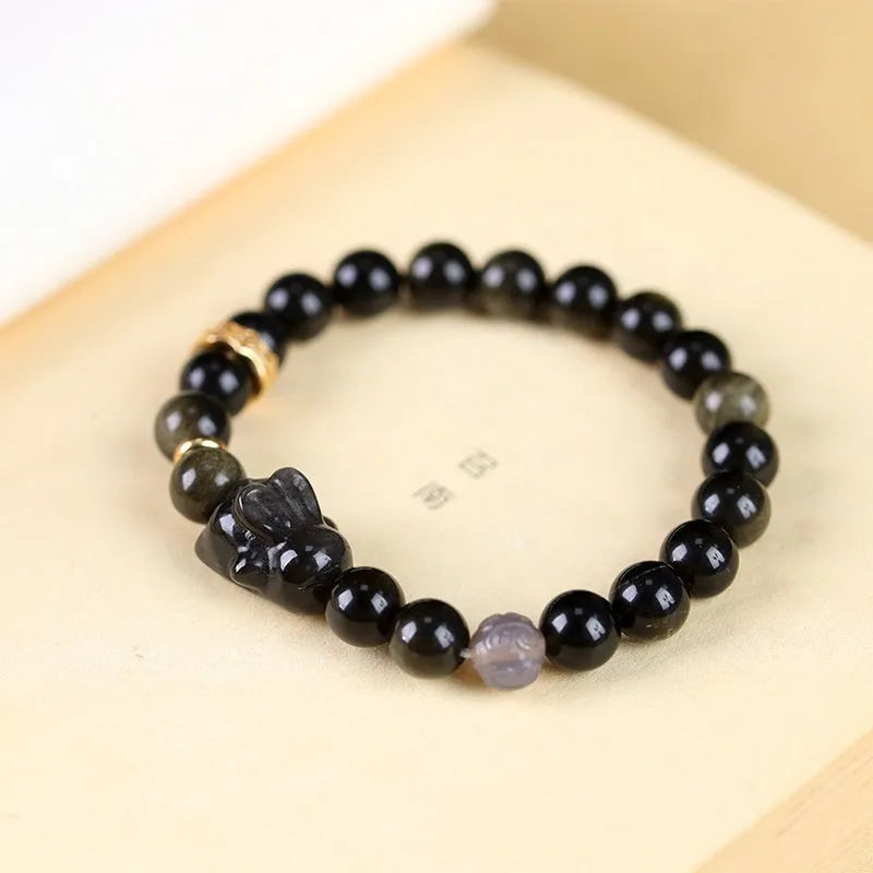 Handmade lying rabbit obsidian bracelet with brass charm and grey agate beads in two sizes