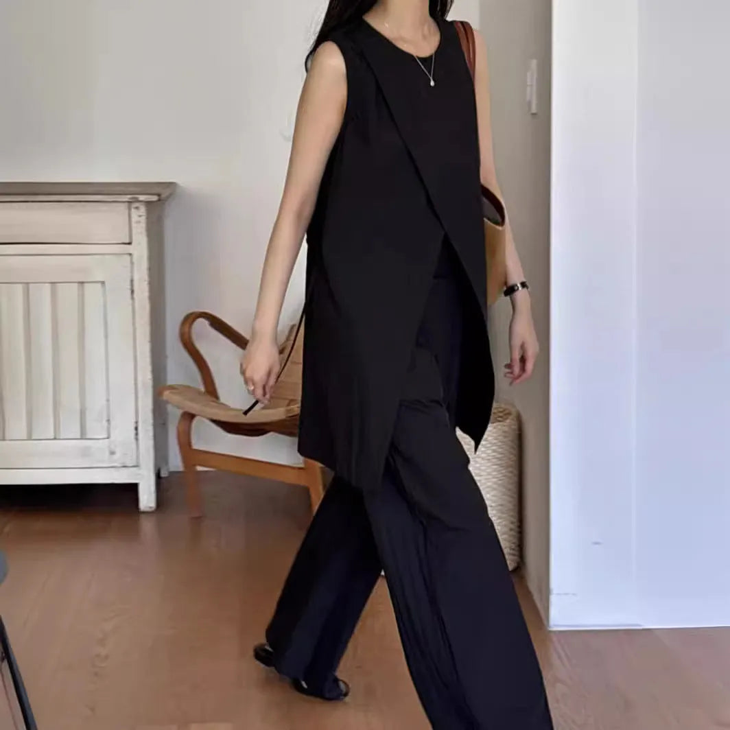 Split sleeveless lace-up top and high waist wide leg pants two-piece set in light apricot or black, average size