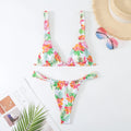 Women's floral print bikini swimsuit in blue colour with matching bra and briefs