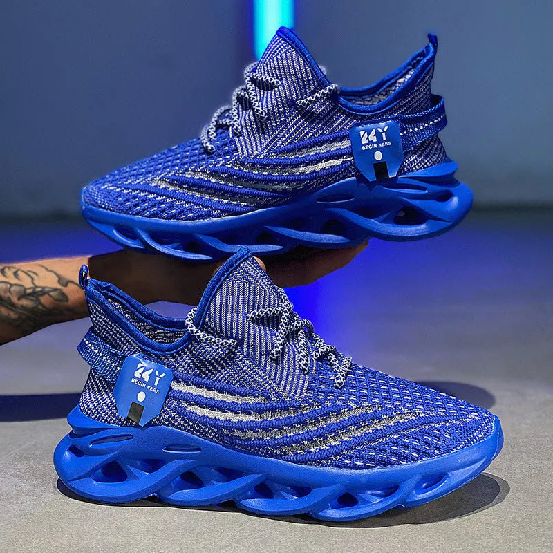 Men's blue flyknit mesh casual sneaker with foam sole and round toe on a white background.