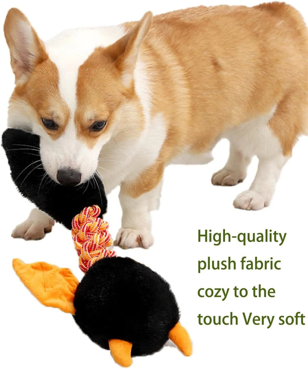 Large black plush dog toy with a rope knot, showing cartoon shape and soft texture.