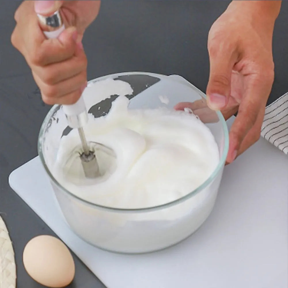 Semi-automatic stainless steel egg beater whisk with hand pressure rotating mechanism in silvery colour