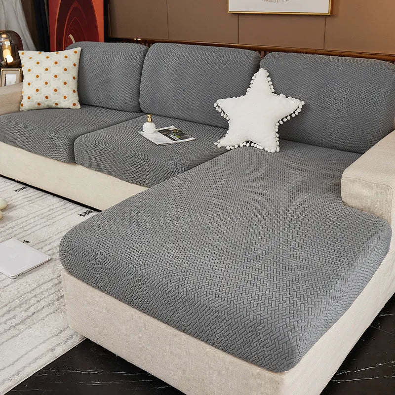 Home Fashion stretch sofa cover in fruit green colour on a modern couch