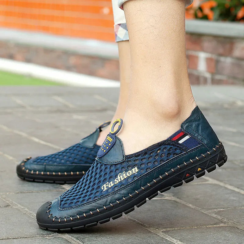 Men's brown breathable mesh casual slip-on shoes with a round toe and rubber sole on a white background.