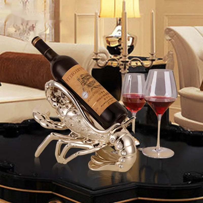 Lobster-shaped wine rack ornament in rose gold or silver holding a wine bottle