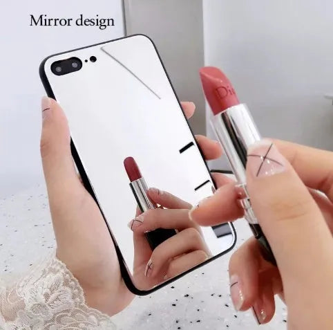 Black iPhone back cover case with a reflective mirror surface and self-timer function.