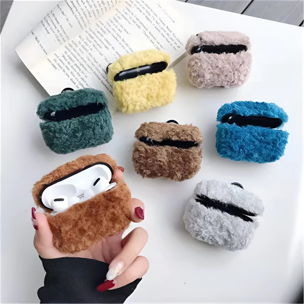 Simple Lamb hard plastic AirPods cover with plush interior in blue, shown next to brown and grey options.