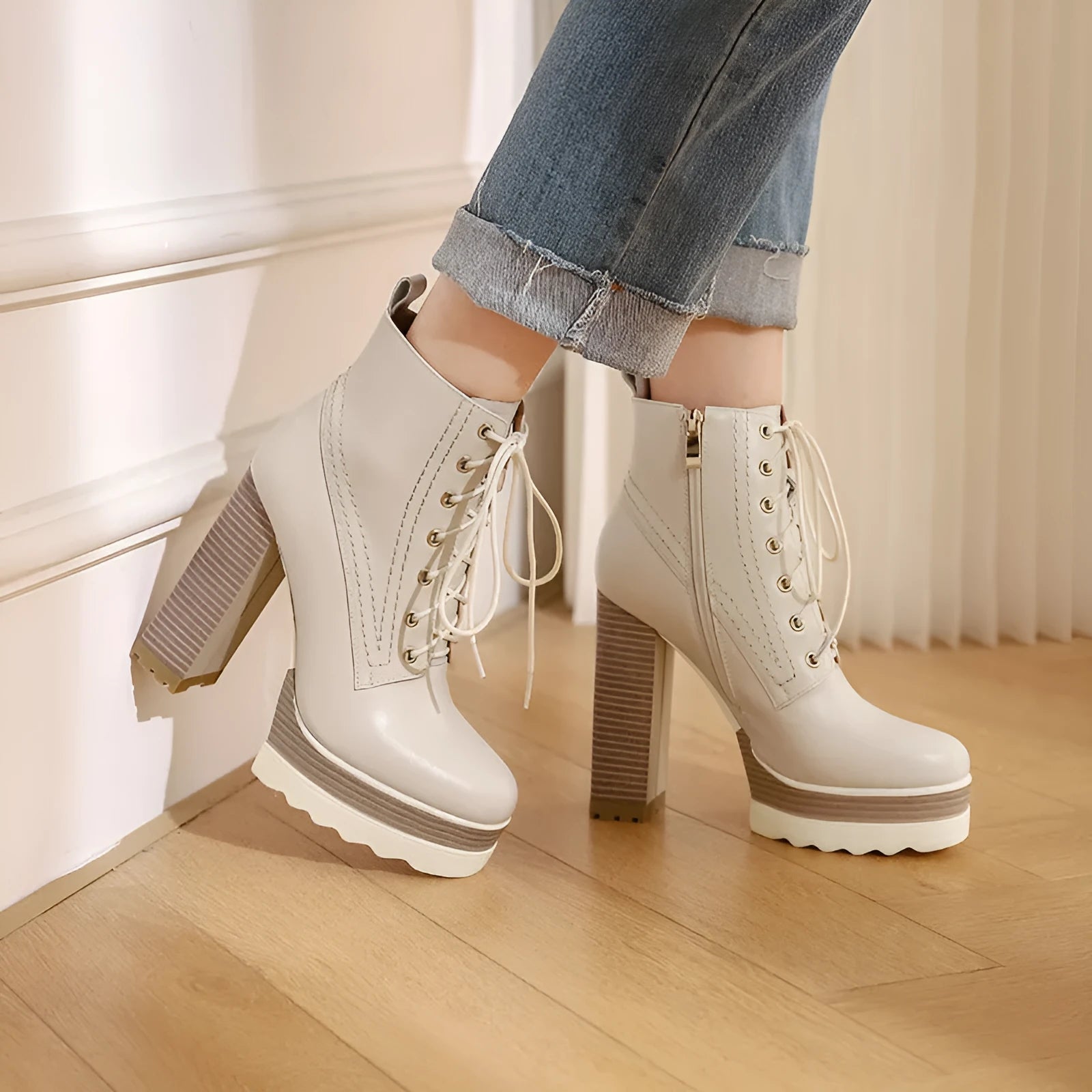 Black women's chunky heel waterproof platform boots with a side zip and round toe.