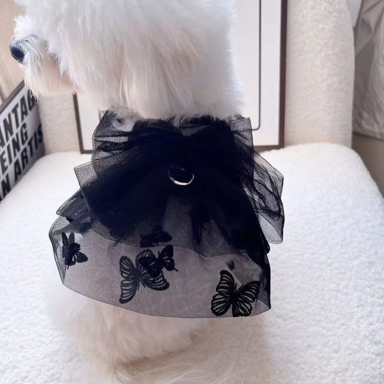 Black gauze tulle skirt pet costume for small to medium dogs and cats on a mannequin.
