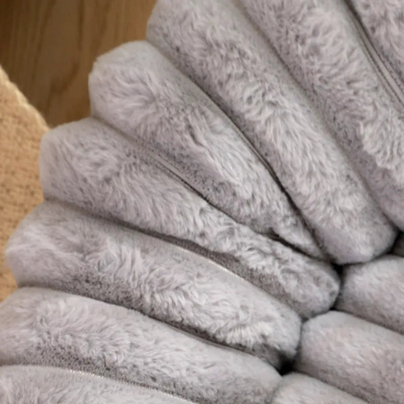 Round long plush dog bed in gray on floor, super soft warm pet sofa with raised edges
