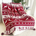 Personalised Christmas acrylic blanket with snowflake design draped over a sofa