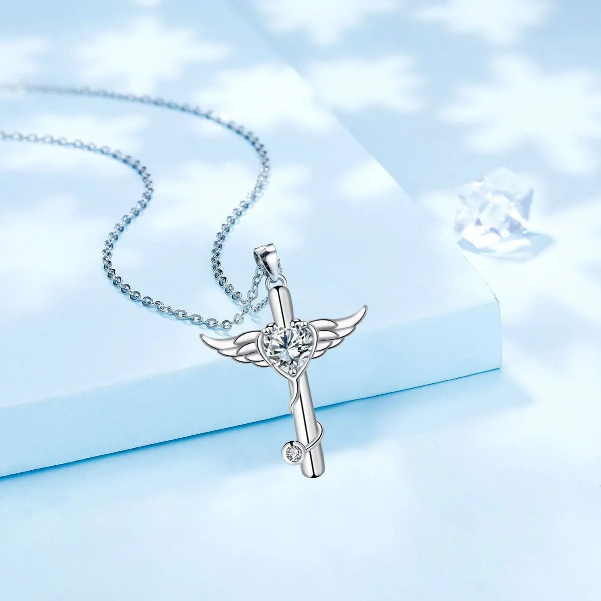 Women's copper necklace with stethoscope, angel wings and cross pendant in electroplated white diamond or red diamond finish