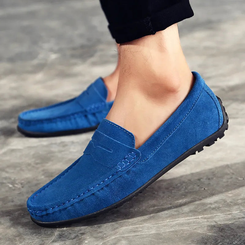Men's suede Gommino loafers in dark green with round toe, sewing details, and a rubber sole.