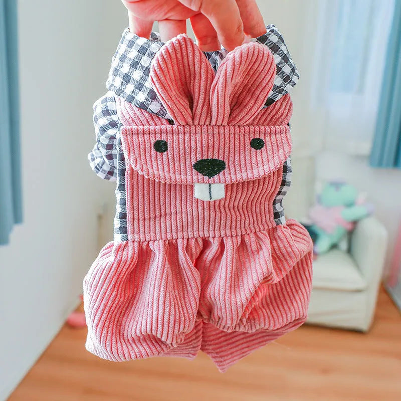 Four-legged plaid overalls for pets in polyester, black grid top, shown on a dog indoors