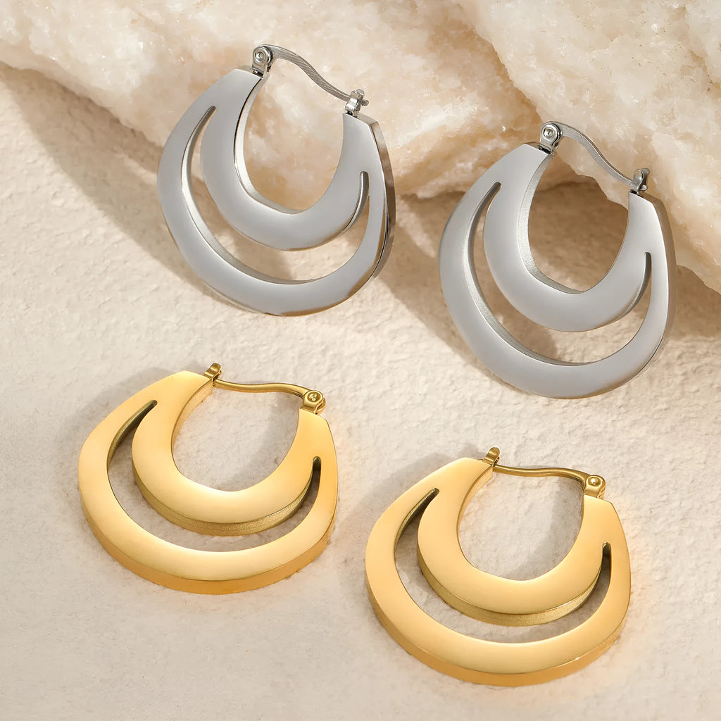 Metallic French geometric earrings with gold plating on stainless steel, featuring round ring elements