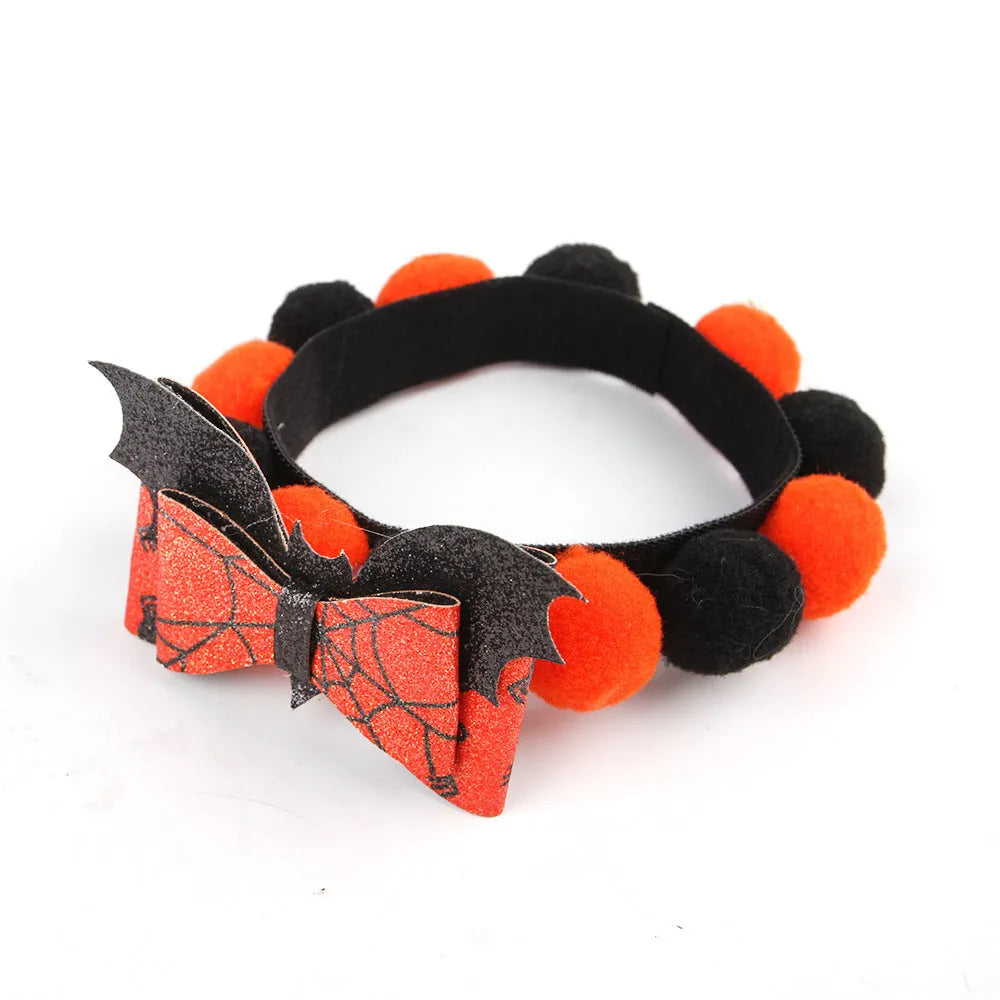 Halloween pet collar with fur ball decoration in orange pumpkin design