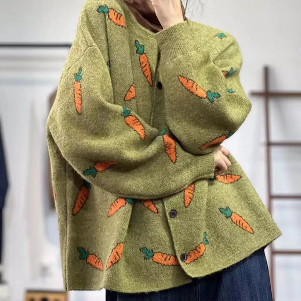 Round neck loose cardigan sweater with artistic colour contrast printing, made from viscose fibre.
