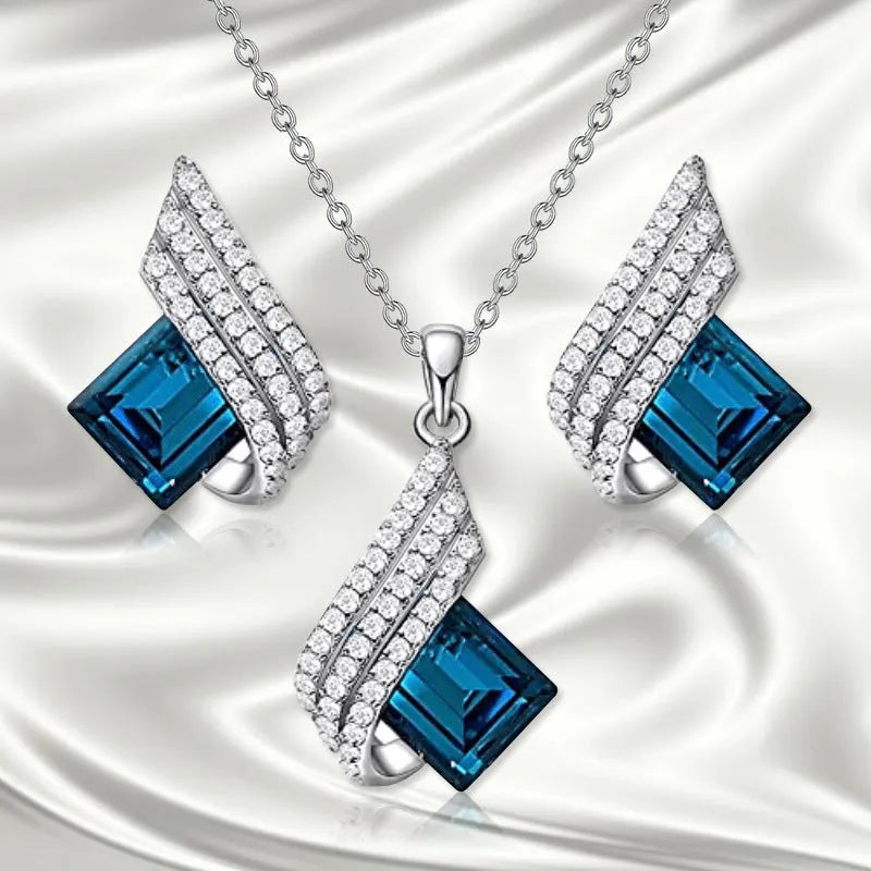 Glass pendant on alloy cross chain necklace with matching electroplated earring studs set