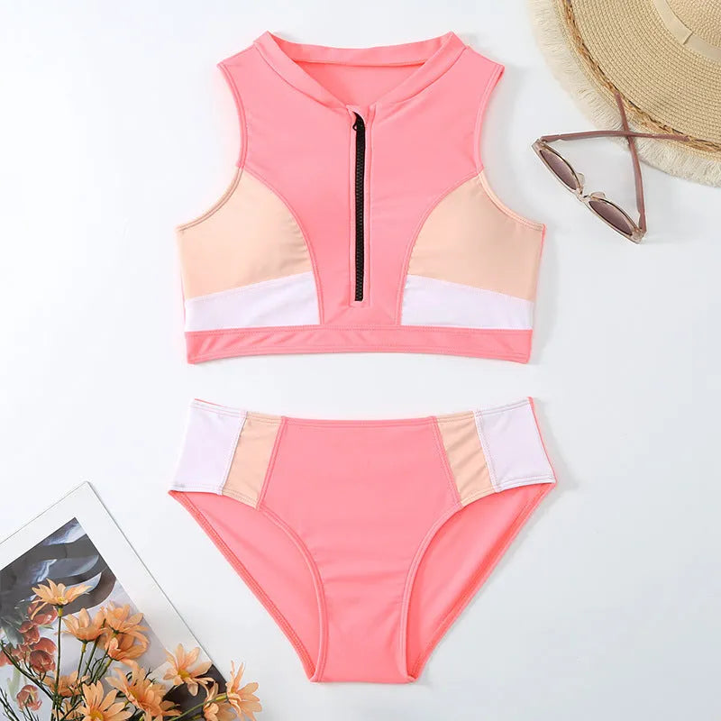 Pink high waist split bikini swimsuit set with bra top and shorts on a mannequin