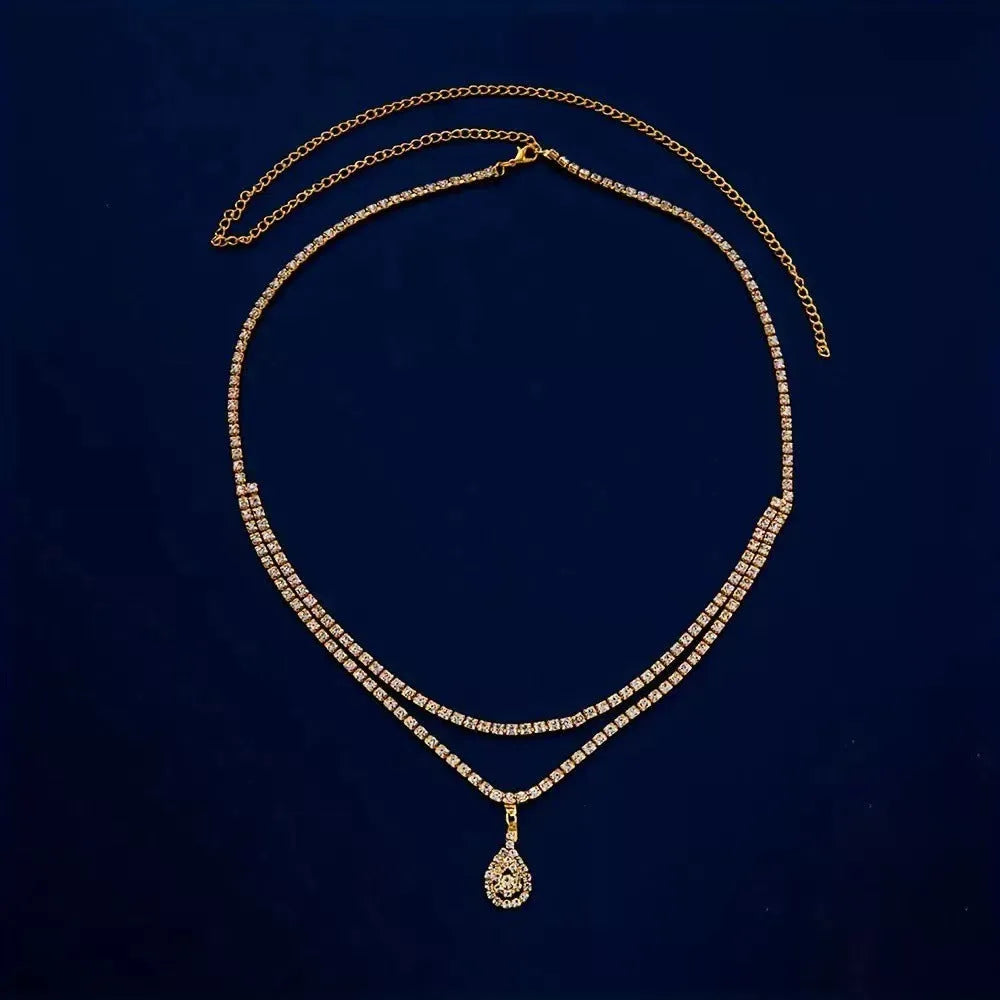 Women's water drop pendant waist chain in gold or silver colour with rhinestone decoration