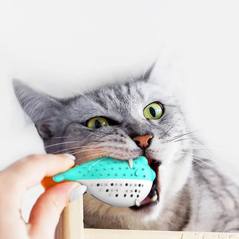 Mint Toys blue silicone fish-shaped cat chew toy with built-in toothbrush cleaner
