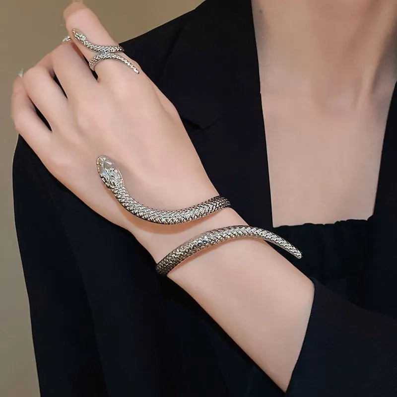 Gold and silver simulated snakes bracelet and ring set with twisted winding design