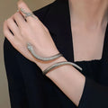 Gold and silver simulated snakes bracelet and ring set with twisted winding design