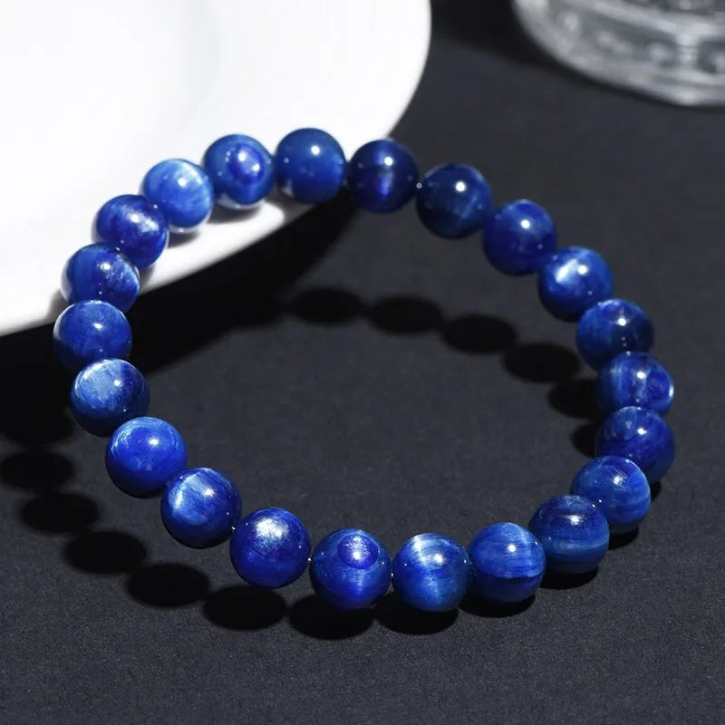 Blue crystal bracelet with geometric Ruyi design showing polished beads in various diameter options