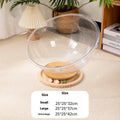 Transparent acrylic space capsule turntable cat bed enclosure shown in clear material with turntable base