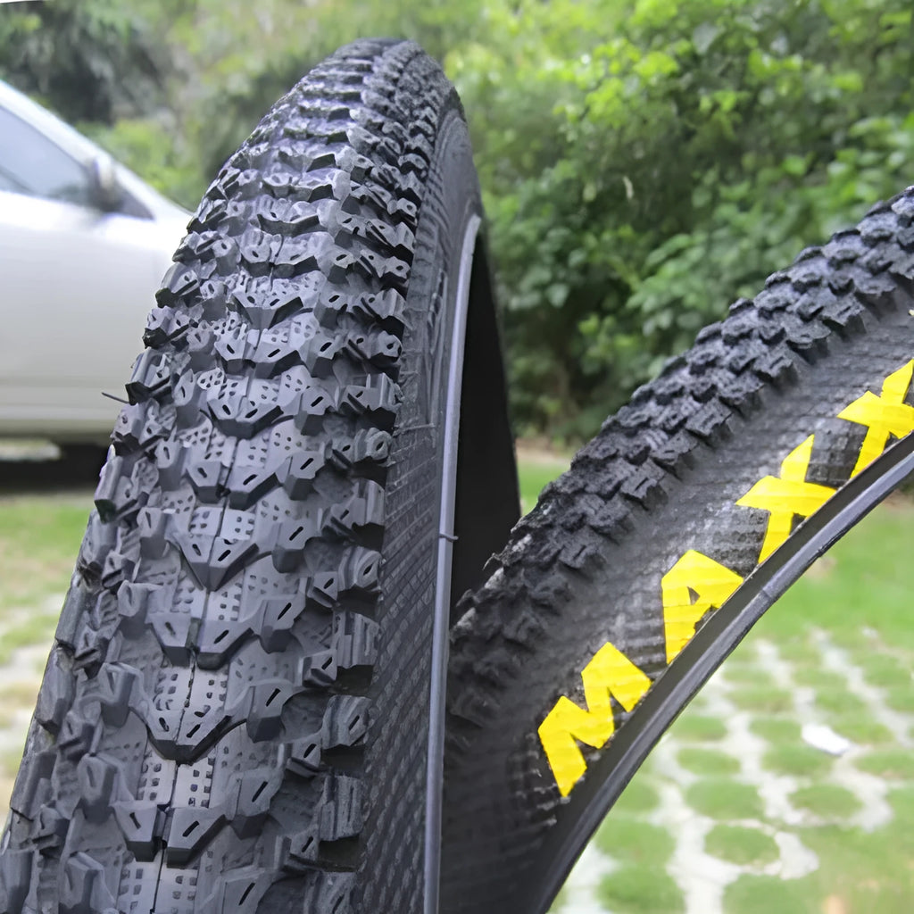 Mountain bike ultralight puncture-proof tyre showing tread pattern and white-label sidewall variant.
