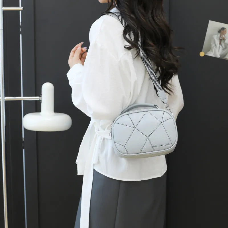 Round women's PU leather patchwork small bag with three-layer design and stitching detail