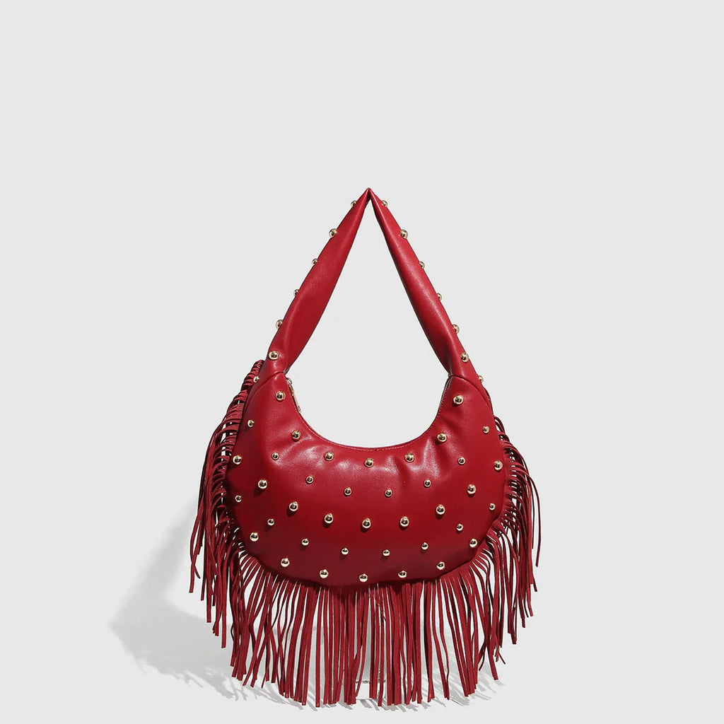 Retro tassel shoulder handbag in black with mobile phone compartment visible