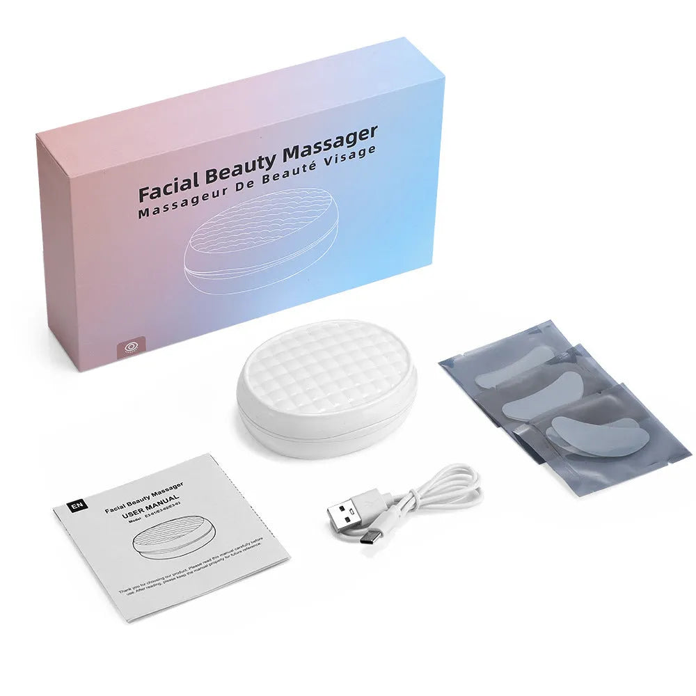 White wireless red light eye and face massager device with EMS function for dark circles