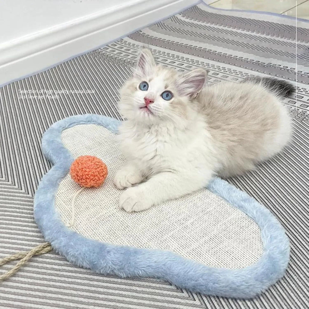 White cat scratching mat with sleeping cat pattern made from natural sisal rope