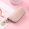 Men's black PU leather zipper key ring case showing waterproof key organiser with car keys