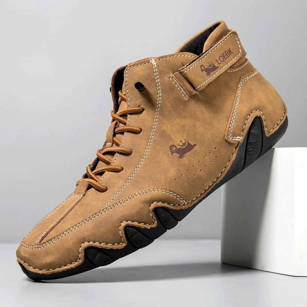 Men's brown high-top Martin boot with lace-up front, round toe, and flat rubber sole on a white background