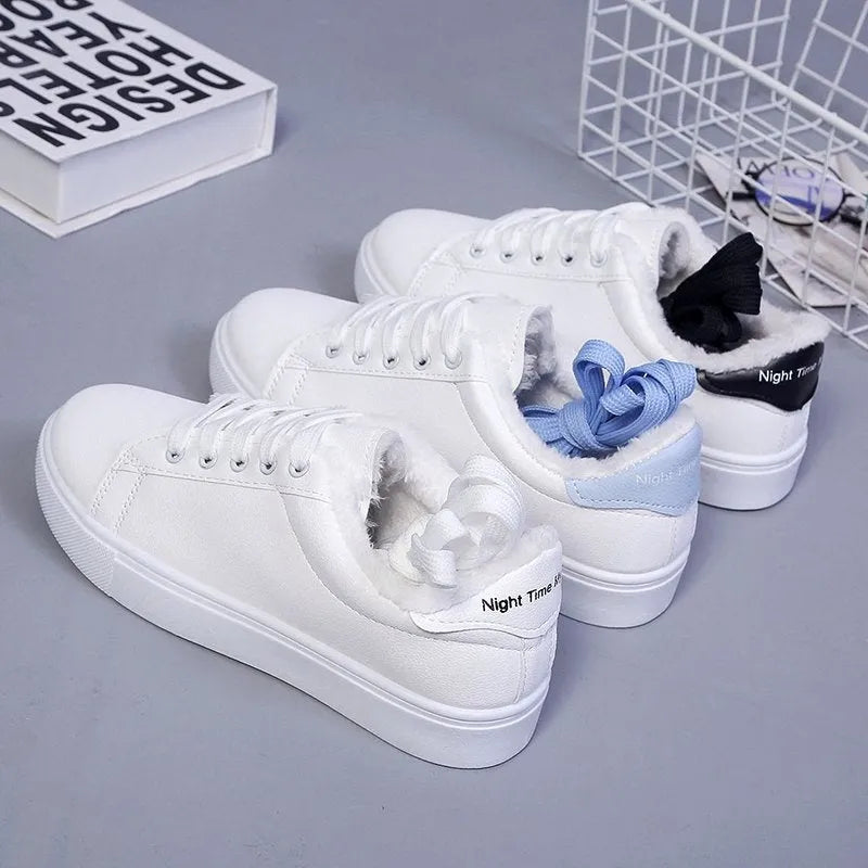 Flat low-top sneakers with PU upper, cloth lining, rubber sole, round toe, in white, black, or blue.