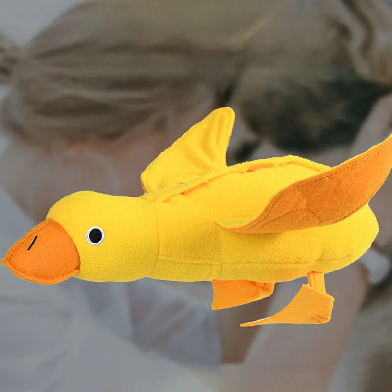 Yellow teddy dog toy with duck attachment and sound module for training and teeth stimulation