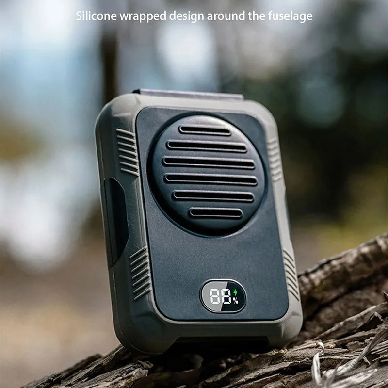 Green portable hanging neck fan for outdoor sports with USB charging cable.