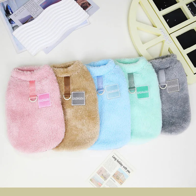 A blue coral fleece jacket for pets with five multi-coloured pull rings for adjustment on the front.