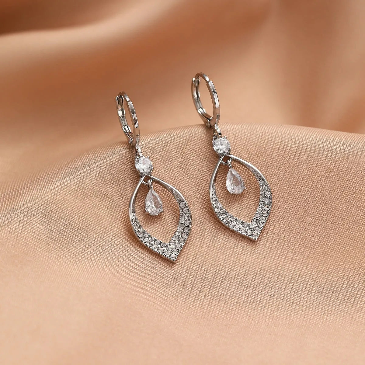 Women's copper zircon water drop earrings with tassels and a choice of gold or silver buckles.