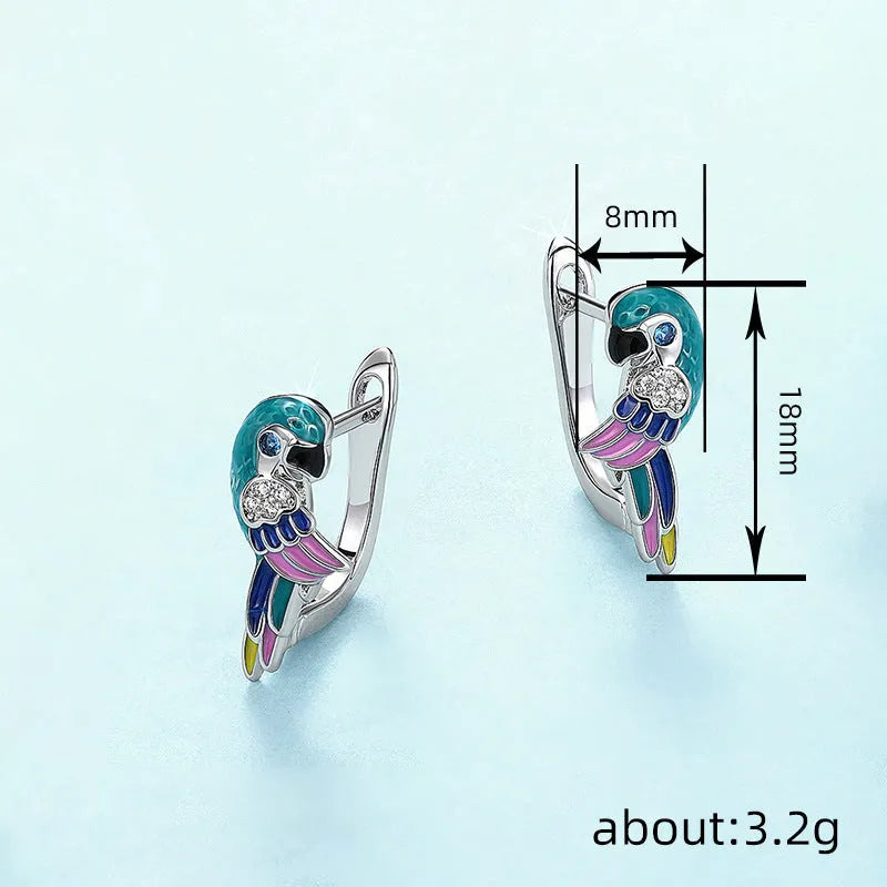White gold colour copper ear clip with inlaid zircon forming a cute simulation parrot bird ornament