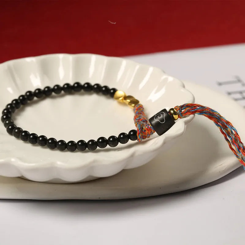 Hand-woven obsidian bead bracelet with adjustable 15.5-16cm strap
