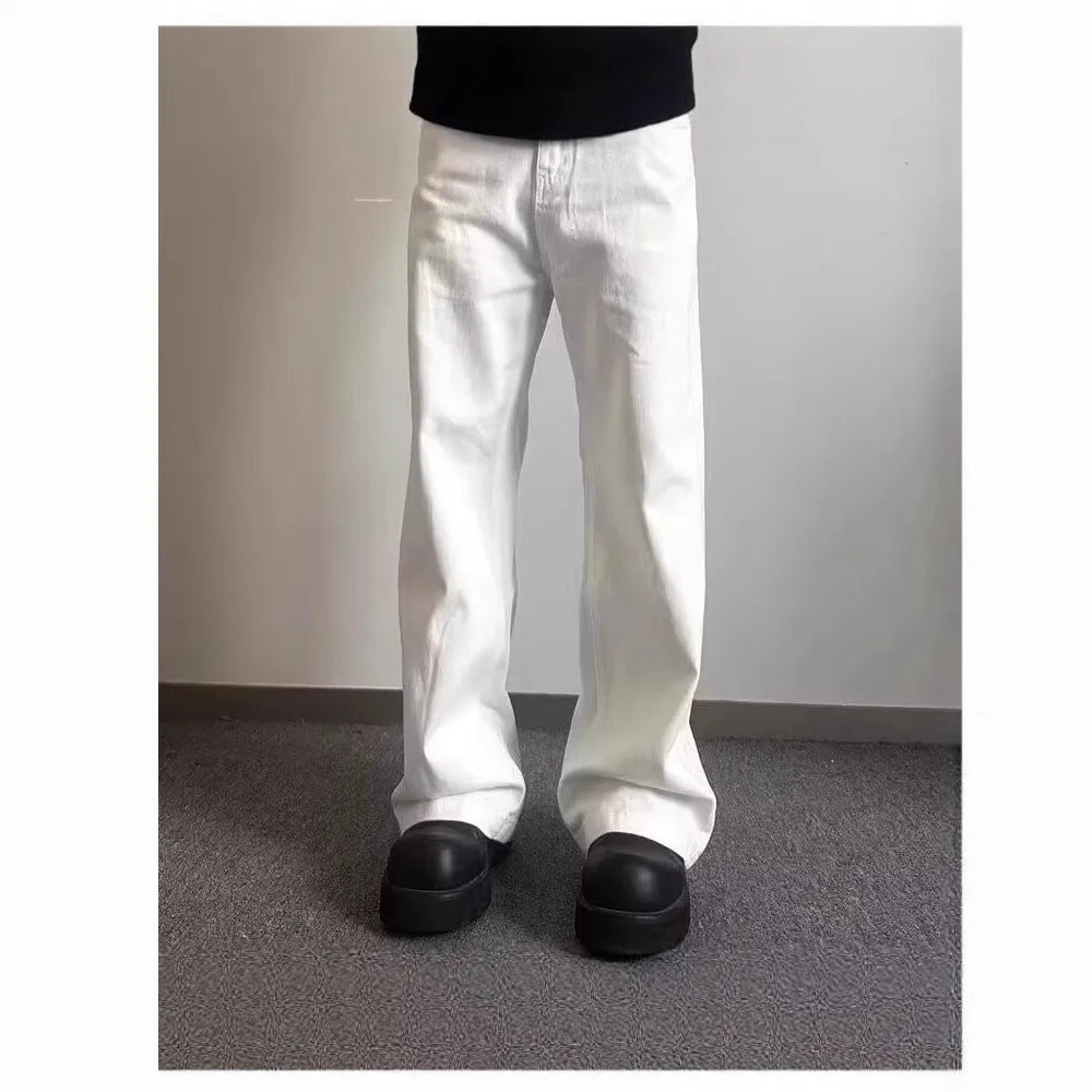 Men's white straight-leg jeans with loose fit and mid-waist cut
