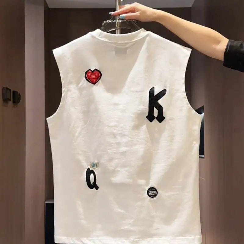 Men's black cotton sleeveless vest t-shirt with a cartoon graphic print, laid flat.
