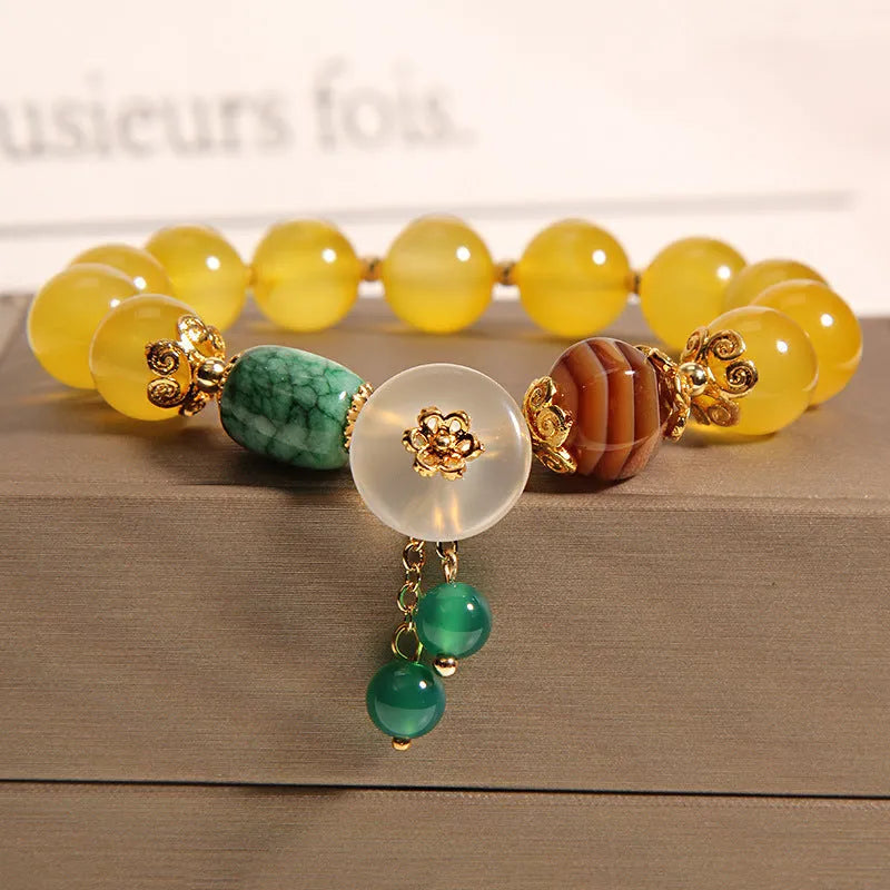 Women's yellow agate crystal bracelet with gold tone accents and khaki silk thread in Japanese Korean style