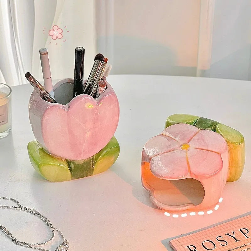 Ceramic floral pen holder storage box with pink tulip design on desktop