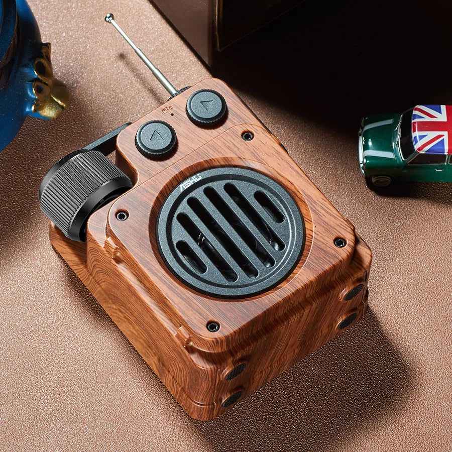 Retro lightweight compact wireless Bluetooth speaker in rosewood gold finish with plastic shell